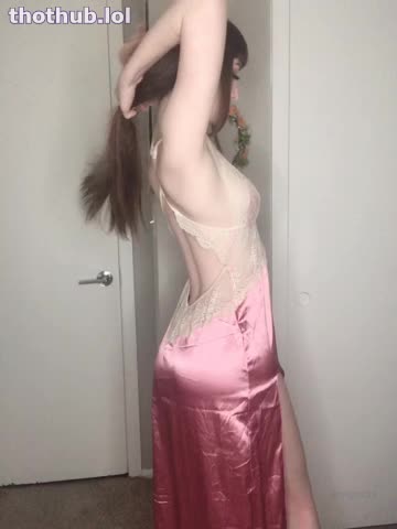 Emi teases in satin dress & thong