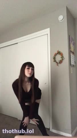 Emi in dark posing